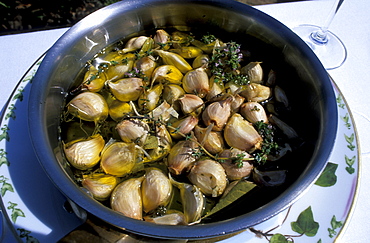 France, Corse Island, Haute-Corse, Calvi, Hotel & Restaurant La Villa, Proprietaire Jean-Pierre Pinelli, Garlic Cooked In Olive Oil