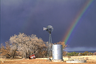 Usa, South West, New Mexico, Rainbow At Acoma Pueblo, Windmill And Tank