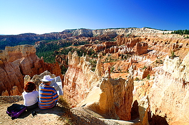 Usa, South West, Utah, Bryce Canyon National Park, Male And Female Hikers Looking At The Landscape