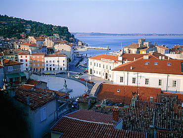 Slovenia, Adriatic Coast, Piran, Overview Of Tiled Roofs, Sea At Back