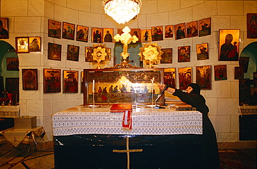 Syria, Qalamun, Saidnaya, Church Of The Notre Dame De Saidnaya, Greek Orthodox Monastery, Elderly Woman Lighting The Candles Before Mass