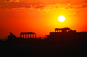 Syria, Palmyra Oasis, The Temple Consecrated In Year 32 To God Bel Seen In Silhouette At Sunrise