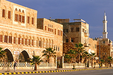 Syria, Mediterranean Coast, Tartus, Seafront Avenue Edged By Palms, Remnants Of Walls Of Fortress Built By The French Crusaders Can Be Seen On The Ground Floor Of Later Buildings