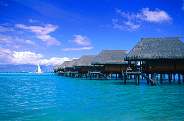 French Polynesia, Windward Islands, Moorea, Hotel Beachcomber On Stilts, Cabins Built On The Lagoon, Tahiti Island In Background