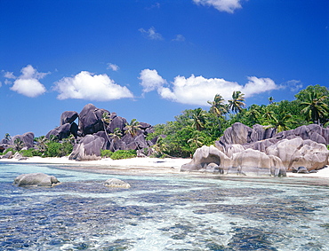 Seychelles, La Digue Island, Source D'argent (Silverspring) Beach Characterized By Huge Basaltic Rocks And Turquoise Lagoon