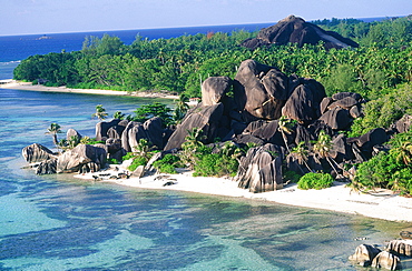 Seychelles, La Digue Island, Aerial Of Source D'argent (Silverspring) Beach Characterized By Huge Basaltic Rocks And Turquoise Lagoon