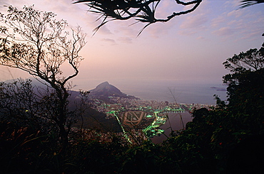 Brazil, Riodejaneiro, The City And Shoreline Seen From Corcovado At Twilight