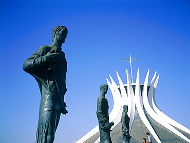 Brazil, Goias, Brasilia, The Administrative Capital Created Par President Kubitschek And Designed By Brasilian Town Planner Lucio Costa & Architect Oscar Niemeyer, The Cathedral And Row Of Statues Lining The Access