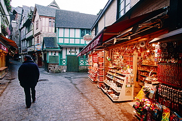 France, Normandy, Manche (50), Mont Saintmichel, The Shopkeepers Mainly Specialized In Selling Souvenirs Most Of Them Very Kitch, The Grand Rue At Dusk In Winter