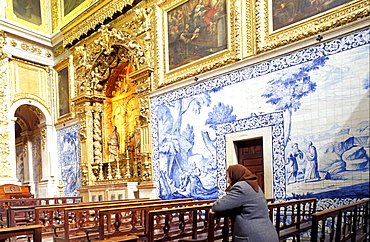 Portugal, Lisbon, Madrededeus Church Famous For Its Azulejos, Woman At Prayer