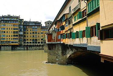 Italy, Tuscany, Firenze, Ponte Vecchio Bridge On River Arno, Side View