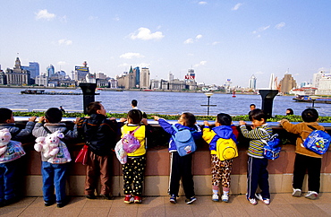 Children looking at River Huangpu, Pu Dong (Pudong) New Town, Shanghai, China, Asia