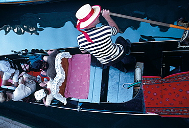 Gondola Seen From A Bridge, Venice, Italy