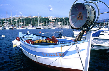 France, Corsica, Porto Vecchio, View Of The City From The Marina, Fishing Boat In Fore