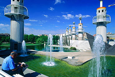 Spain, Catalonia, Barcelona, Industrial Park Designed By Ganchegui And Rius I Camp, Man Reading Newspaper