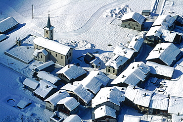 France, Alps In Winter, Savoie, Aerial Of A Small Mountain Village 