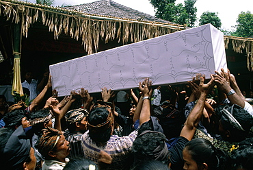 Indonesia, Bali, Agung, Burial Ceremony Of A Brahman In His House Yard, The Coffin Is Held By The Family Members