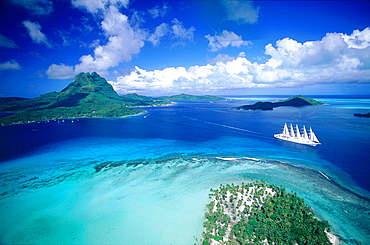 French Polynesia, The Leeward Islands (Iles Sous-Le-Vent), Bora-Bora Island, Aerial Of A Liner Leaving The Lagoon