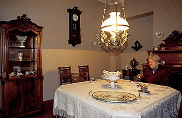 Russia, St-Petersburg, Writer Dostoievsky Apartment, Mrs Popovska Head Of Museum Sitting At His Dining Table  