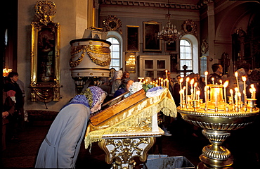 Russia, St-Petersburg, Transfiguration Church, Woman Kissing A Holy Icon