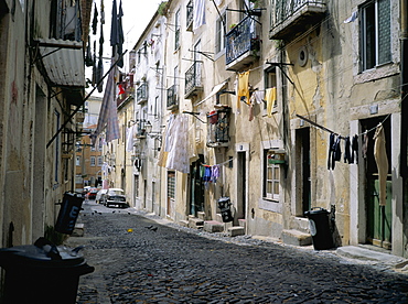 Narrow street in the Alfama quarter, Lisbon, Portugal, Europe