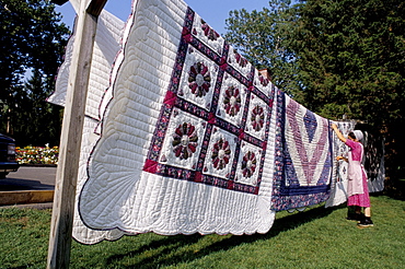 Quilts hanging on a line, Amish country, Pennsylvania, United States of America, North America