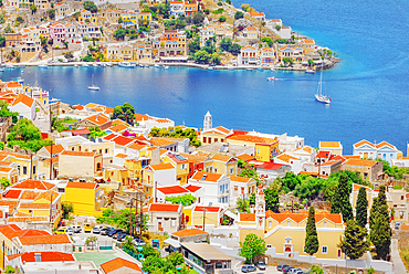 View over Chorio (upper town) and Gialos harbour, Chorio, Symi Island, Dodecanese Islands, Greece