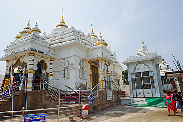 The hilltop Digambara Jain Temple stands above the Udayagiri and Khandagiri complex of caves dating back to over 100 years BCE, Bhubaneswar, Odisha, India, Asia