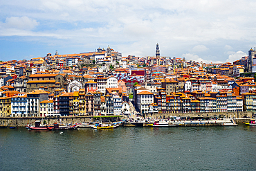 View across the Duoro River towards Porto's historic centre and embankment promenade, UNESCO World Heritage Site, Porto, Norte, Portugal, Europe