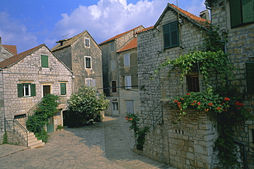 Street in the port of Stari Grad, Hvar Island, Dalmatia, Dalmatian coast, Adriatic, Croatia, Europe