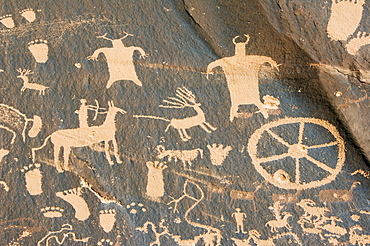 Newspaper Rock, a petroglyph panel etched in sandstone recording perhaps 2000 years of human activity in the area, Newspaper Rock Recreation Site, Utah, United States of America, North America