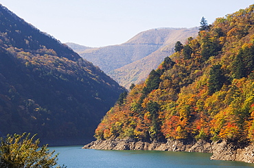 Reservoir surrounded by mountains with autumn coloured trees, Nagano Prefecture, Honshu Island, Japan, Asia