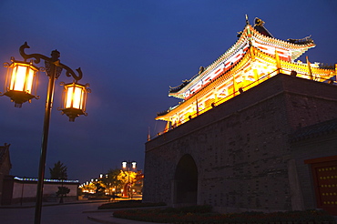 Illuminated City Gate and watch tower, UNESCO World Heritage Site, Qufu City, Shandong Province, China, Asia