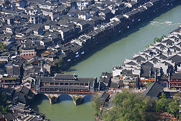 Looking down on a wind and rain bridge in the old town of Fenghuang, Hunan Province, China, Asia