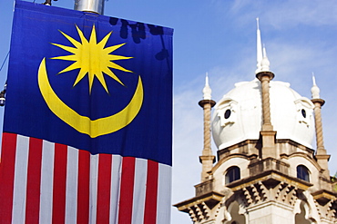 Malaysian flag and Old KL Railway Station, Kuala Lumpur, Malaysia, Southeast Asia, Asia