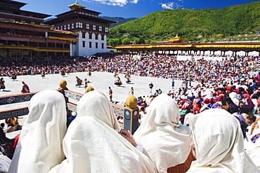 Spectators watching the Autumn Tsechu (festival) at Trashi Chhoe Dzong, Thimpu, Bhutan, Asia