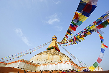 Pigeons and prayer flags on Boudha Stupa (Chorten Chempo), Boudhanath, Kathmandu, Nepal, Asia