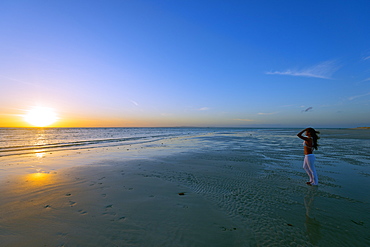 Girl on Sugar Beach at sunrise, Bantayan Island, Cebu, The Visayas, Philippines, Southeast Asia, Asia