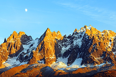 Moon rising over Aiguilles des Chamonix, Chamonix, Rhone Alps, Haute Savoie, France, Europe