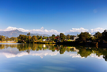 Reflection of Annapurna 8000m mountain range and Machapuchare (Fishtail mountain) 6993m, Pokara, Nepal, Himalayas, Asia