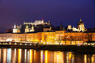 View of the old town, UNESCO World Heritage Site, and Hohensalzburg Castle at dusk, Salzburg, Austria, Europe