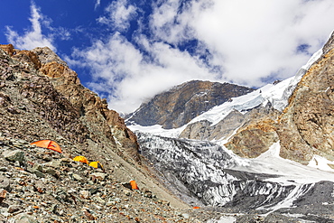 Tents at Camp 1 at 5100m on Peak Korzhenevskaya, 7105m, Tajik National Park (Mountains of the Pamirs), UNESCO World Heritage Site, Tajikistan, Central Asia, Asia