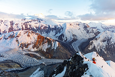 Tent at Camp 4 at 6100m on Peak Korzhenevskaya, 7105m, at sunset, Tajik National Park (Mountains of the Pamirs), UNESCO World Heritage Site, Tajikistan, Central Asia, Asia