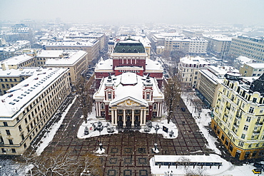 Aerial view of Ivan Vazov National Theatre in a snow storm, Sofia, Bulgaria, Europe