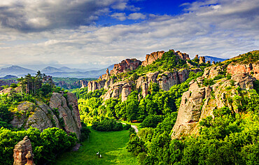 Aerial view by drone of rock formations and forest, Belogradchik, Bulgaria, Europe