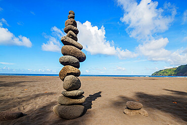 Waipio valley north shore, rocks stacked on the beach, Big Island, Hawaii, United States of America, North America