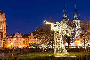 Christmas Market at Old Town Square, including angel, Rococo Kinsky Palace and Gothic Tyn Church, Old Town, UNESCO World Heritage Site, Prague, Czech Republic, Europe