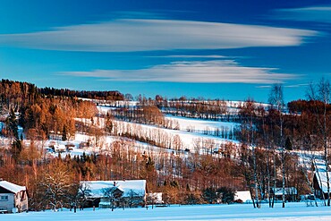 Snow-covered countryside in Jizery Mountains at sunset, Zlata Olesnice, Liberec Region, Czech Republic (Czechia), Europe