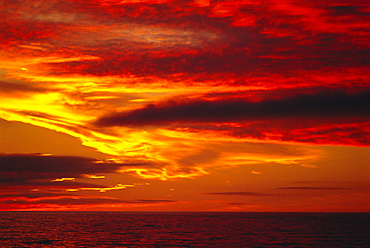 Dramatic sky and red clouds at sunset, Antarctica,, Polar Regions