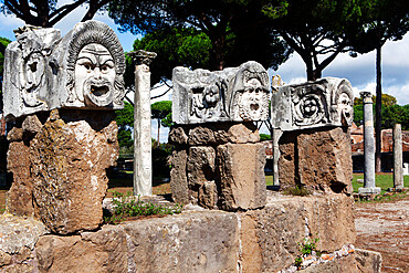 Traditional theatre masks, Ostia Antica, Lazio, Italy, Europe